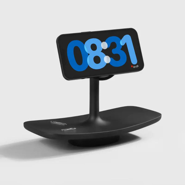 Black smartphone docking station with adjustable stand and digital clock display by Craft Kittiesfr.