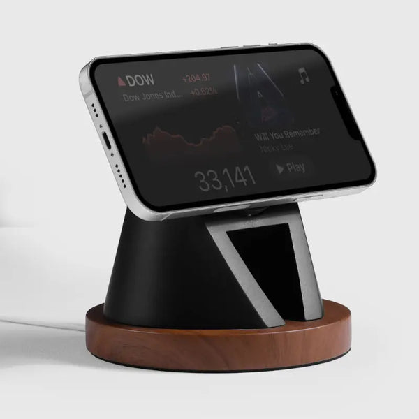 Wood and black charging stand for MagSafe, featuring an angled design for iPhone display.