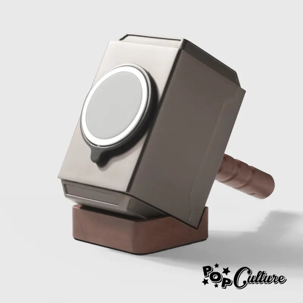 Silver Mjöllnir hammer replica with a wooden base by Craft Kittiesfr, featuring a circular emblem on the side.