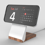 Elegant wood and white MagSafe phone charger stand with 15W charging capability. Perfect for iPhone and Android devices.