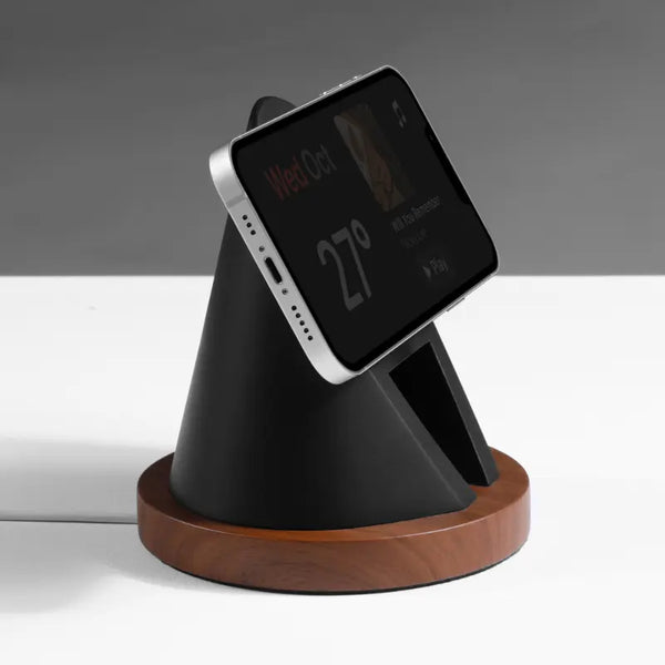 Black and wood charging stand for phones, featuring a modern tipi design and MagSafe compatibility by Station de charge.