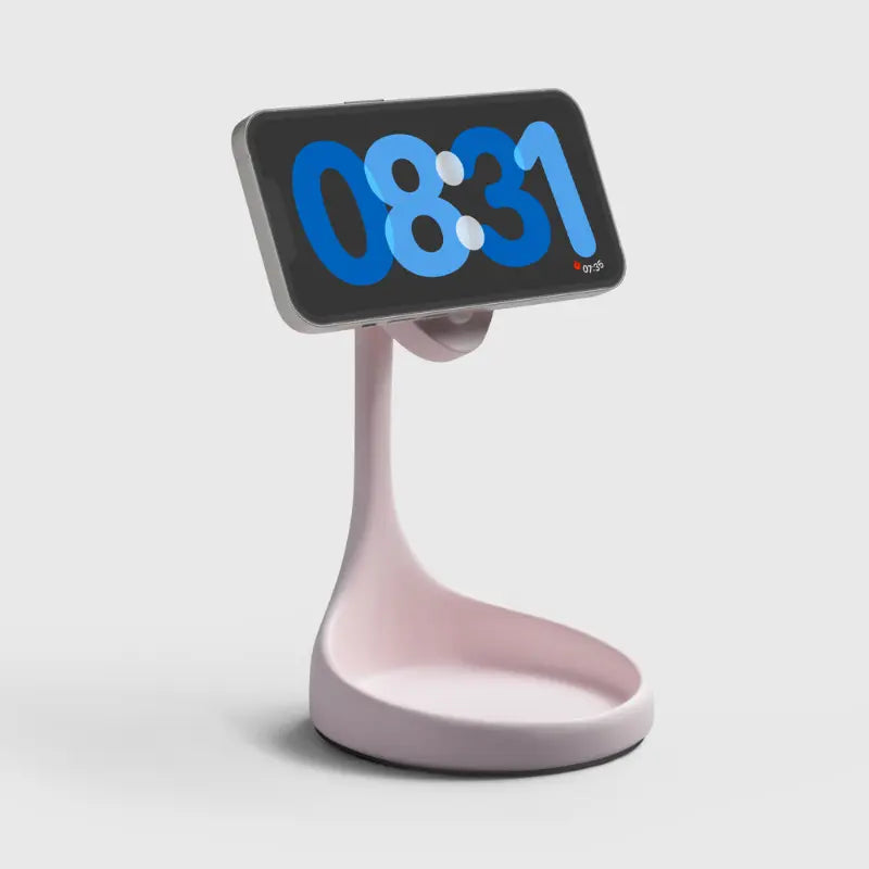 Pink phone stand with a curved base and digital clock display showing time 08:31.