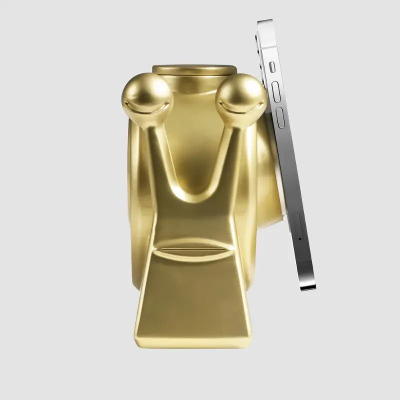 Gold snail-shaped phone charger by Craft Kittiesfr, featuring a unique pop culture design.