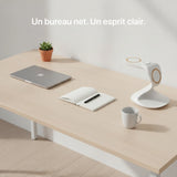 White 3-in-1 charger from Craft Kitties with geometric design on a light wooden desk.