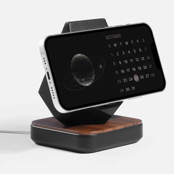 Wood and marble MagSafe phone stand from Station de charge, featuring modern design and sleek black finish.