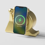 Golden snail-shaped wireless charger for smartphones by Craft Kittiesfr, featuring a sleek design and charging indicator.