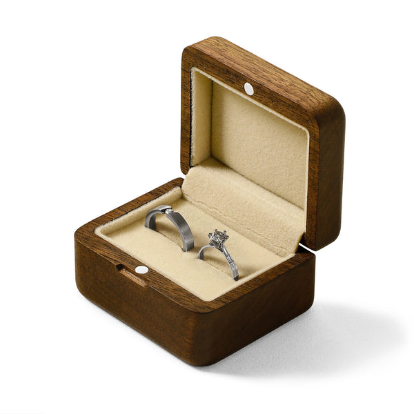 Personalized wooden ring box with soft interior, featuring space for two rings, by Noyer Noir.