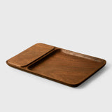 Brown wooden wireless charger with a sleek design from Noyer noir