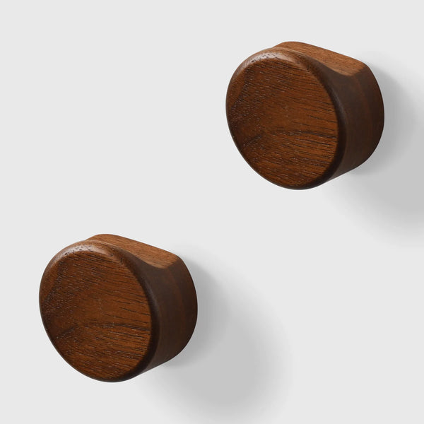 Magnificent wall-mounted magnetic hooks in dark wood by Noyer noir, designed for multifunctional storage solutions.